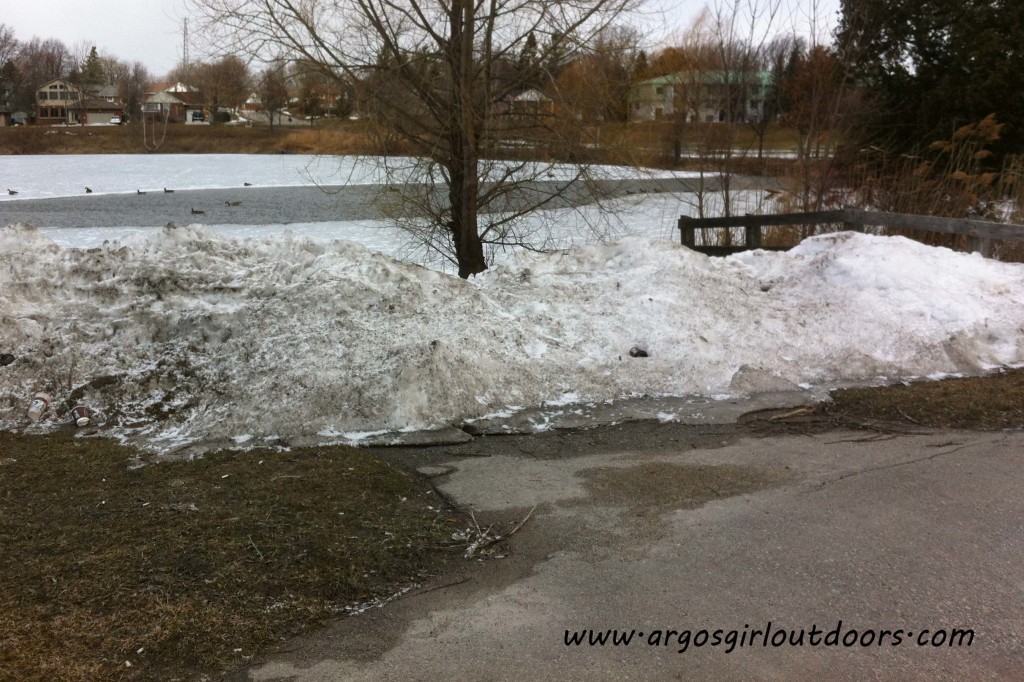 We're going to need some warm weather before this snowbank on the boat ramp disappears.
